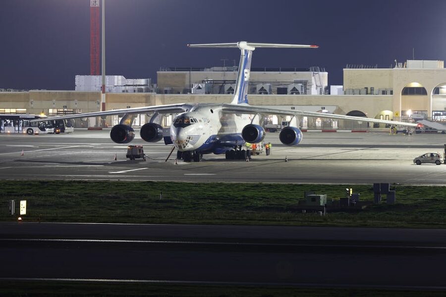 Aircraft on runway at night airport layover