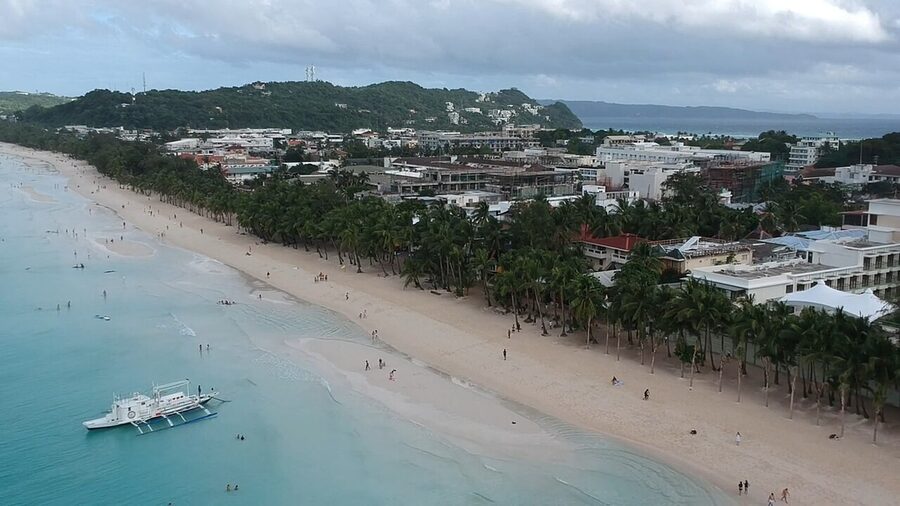 Aerial drone shot of Boracay island showing White Beach and resorts