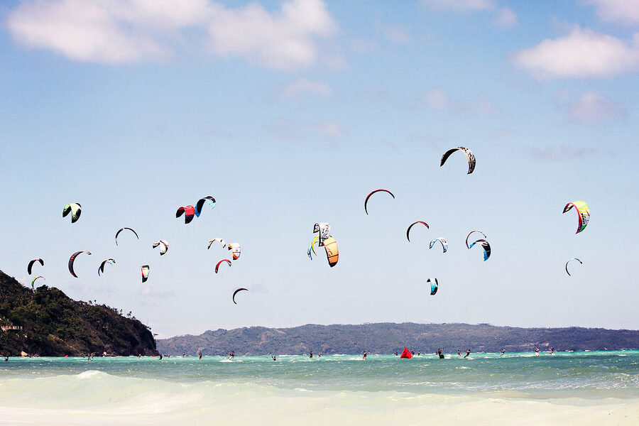 Kites in the air over Bulabog Beach Boracay during kitesurfing season