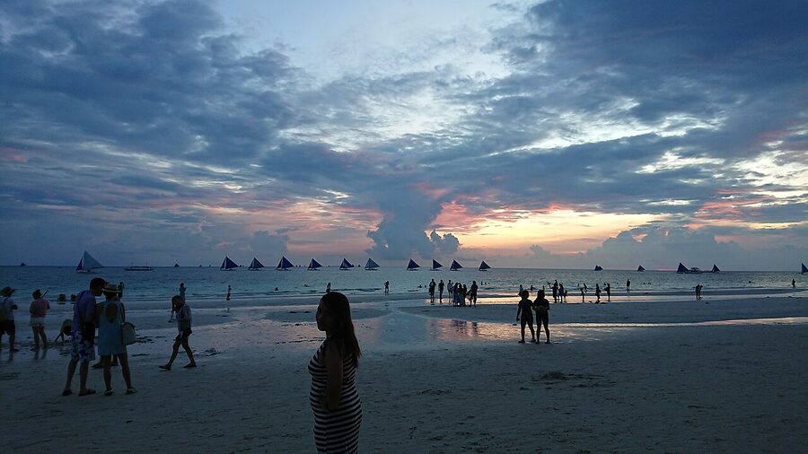 Boracay White Beach Station 1 with crystal clear water, palm trees and white sand