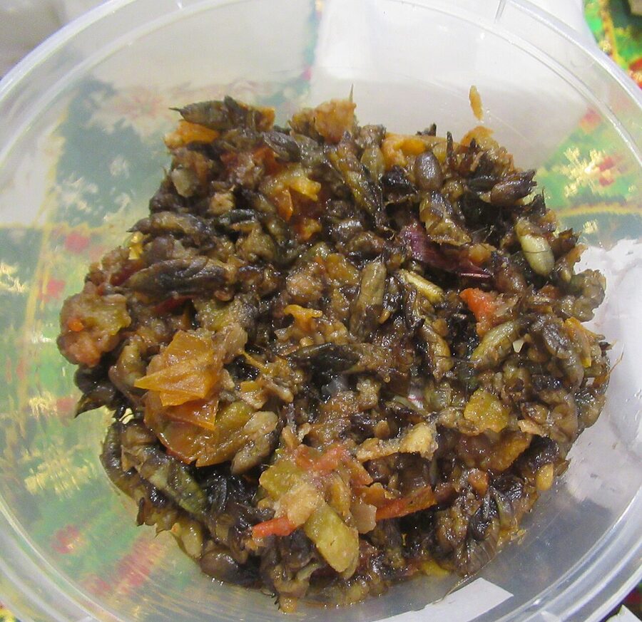 Adobong kamaru mole crickets stewed in soy and vinegar in a glass bowl