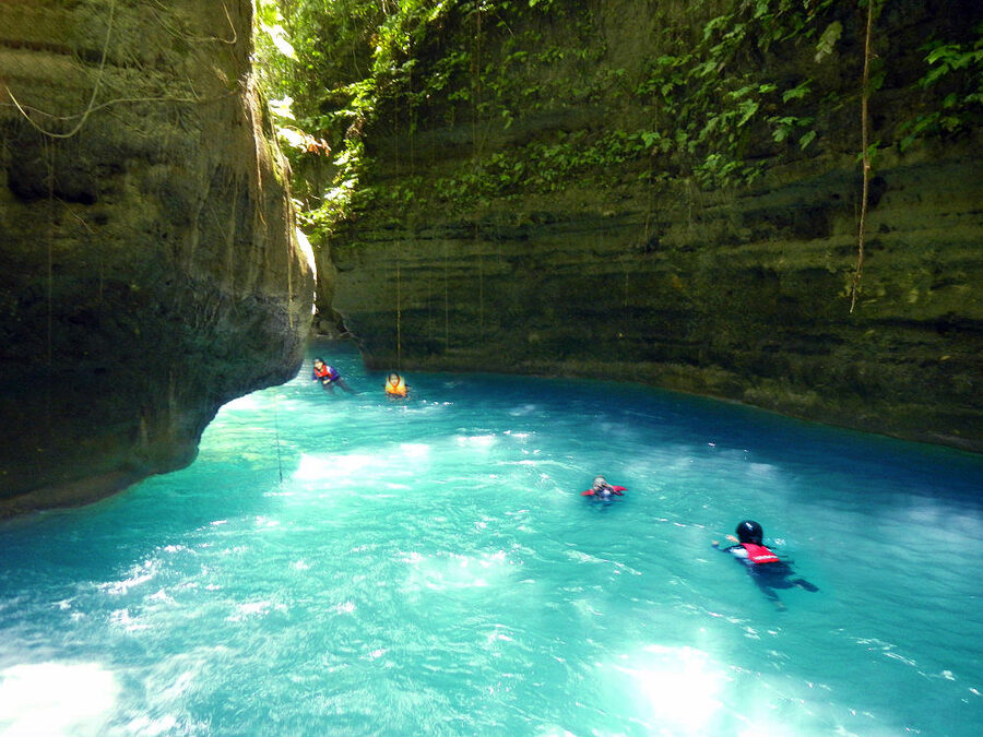 Canyoneering jump in Kawasan, Badian