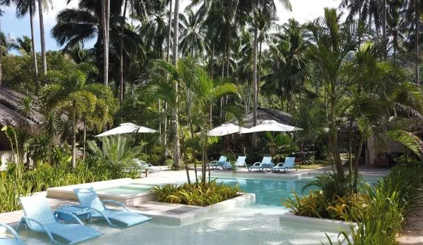 Mahogany Resort El Nido tropical pool and rooms
