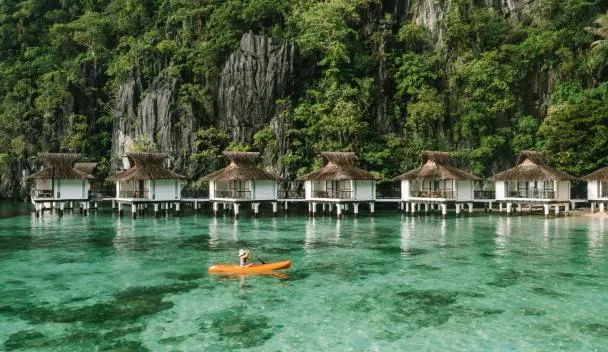 Miniloc Island Resort water cottages and lagoon El Nido