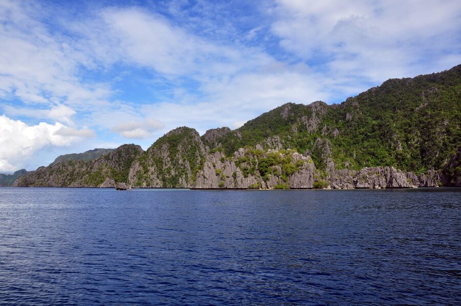 Bangka heading out from El Nido for an island-hopping tour