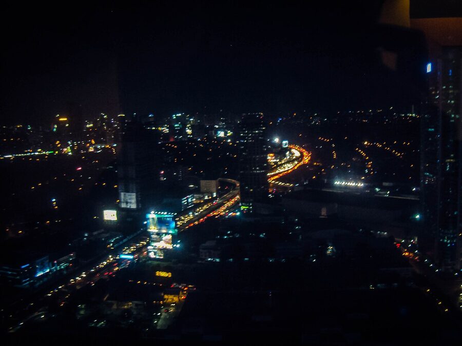 EDSA at night in Manila with traffic snaking down the highway