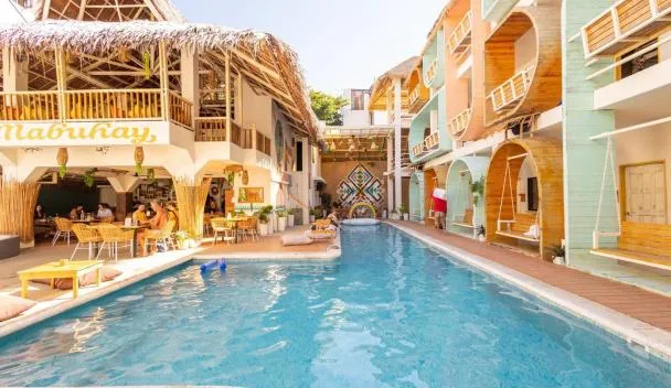 Happiness Hostel Boracay pool with travellers around