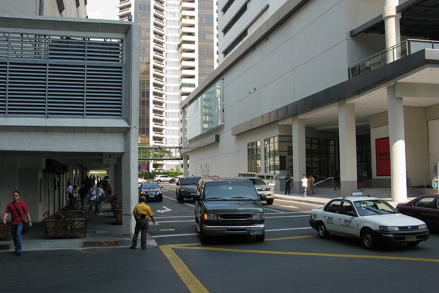 Heavy car traffic in central Makati on a city avenue