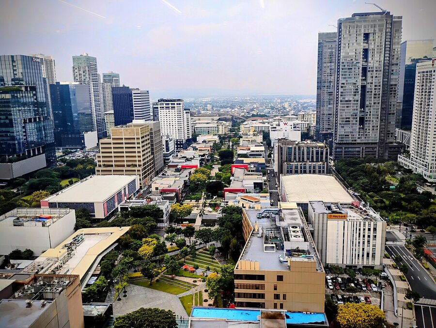 Bonifacio High Street in BGC viewed from above with skyscrapers and trees