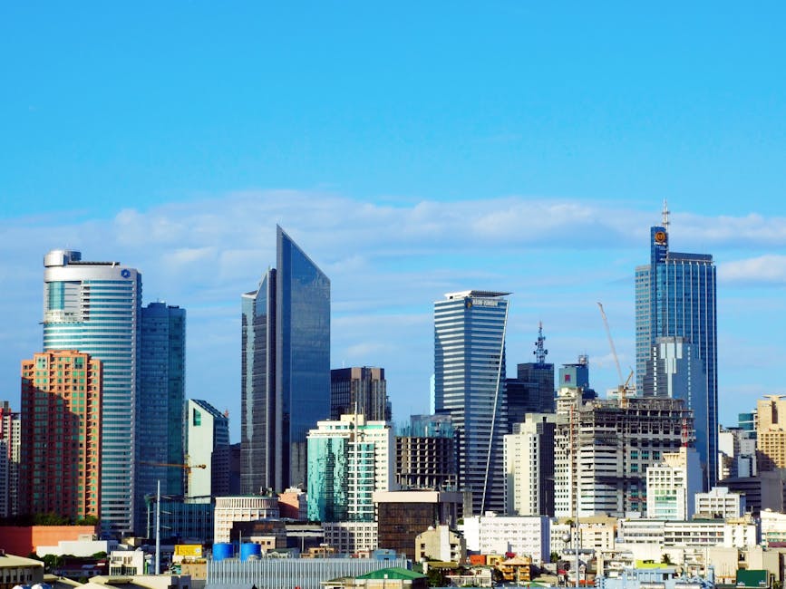 Makati CBD skyline with skyscrapers under blue sky