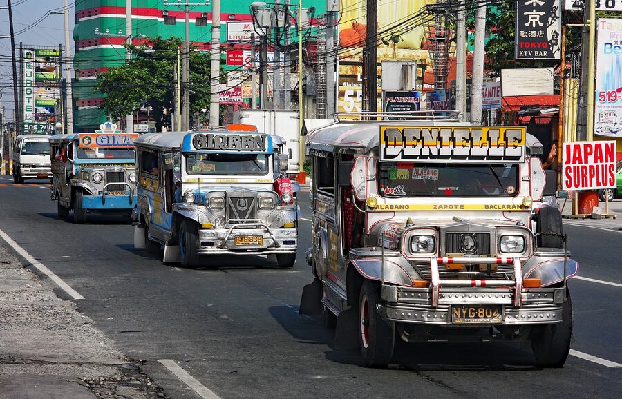 Jeepney commuting through Manila streets