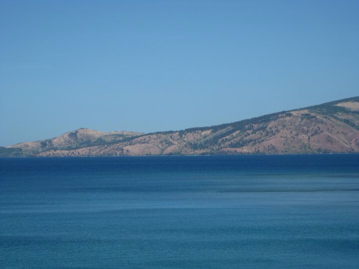 Bataan coastline near Anvaya Cove with calm sea and mountains