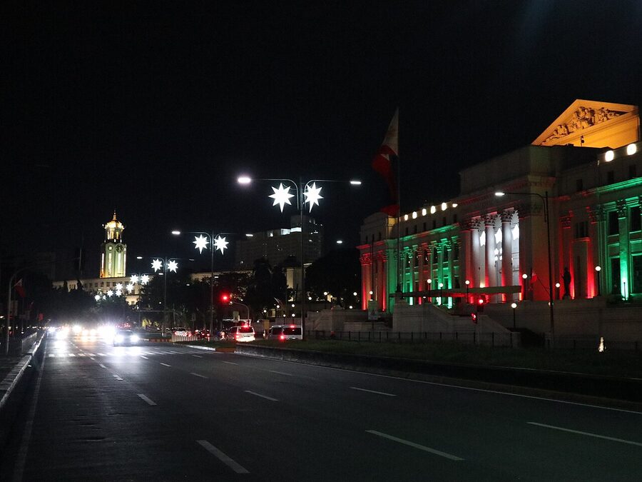 Manila City Hall clock tower illuminated at night