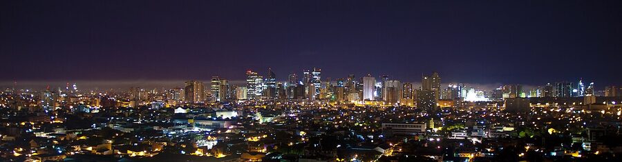 Makati skyline at night seen from across a river