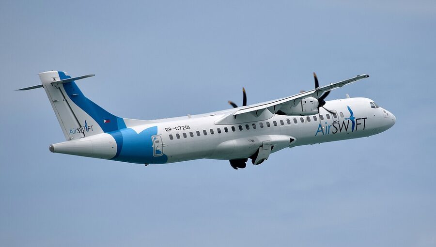 AirSWIFT ATR 42-600 turboprop in flight after takeoff from Palawan, Philippine flag on tail