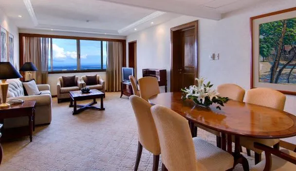 Marco Polo Plaza Cebu suite interior with a view