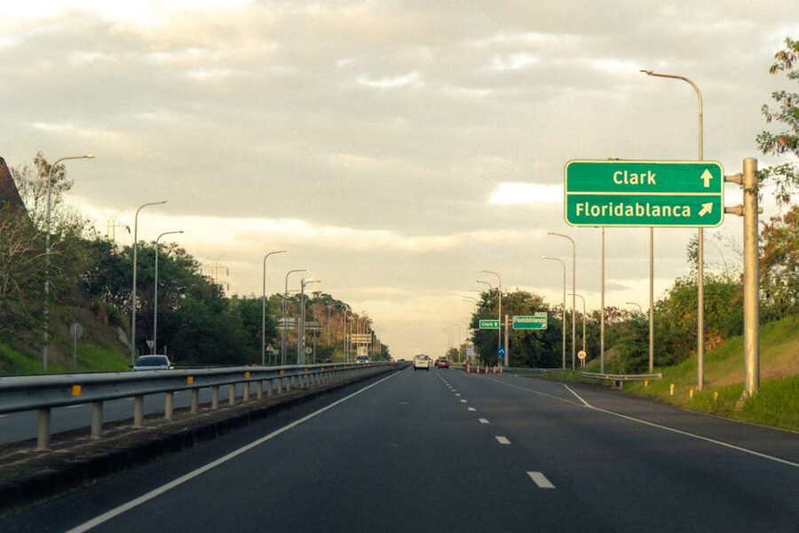 North Luzon highway sign for Clark and Floridablanca Pampanga at sunrise
