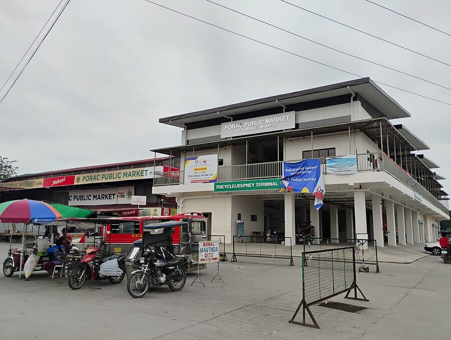 Public market in Pampanga with tricycles parked outside