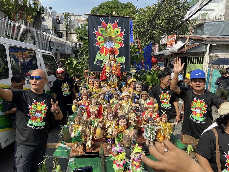 Ati-Atihan Festival participants painted in soot dancing in Kalibo Aklan