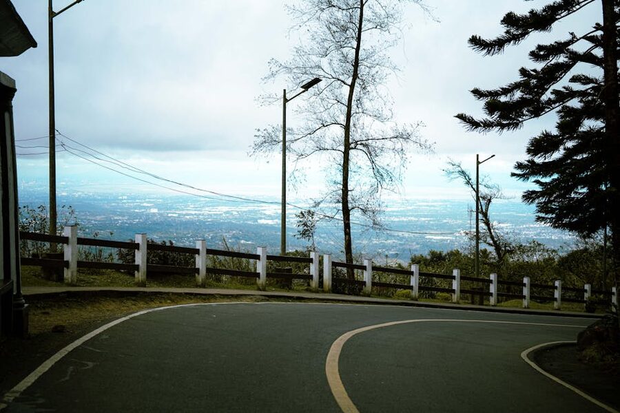 Winding mountain road overlooking Tagaytay City, Philippines
