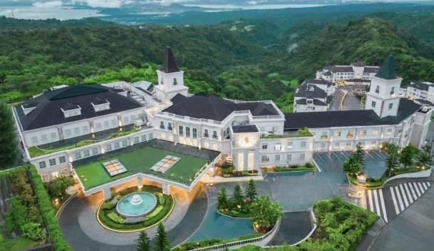 Twin Lakes Hotel Tagaytay exterior with European-style facade and outdoor seating