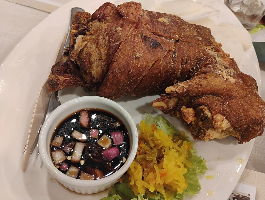 Crispy pata deep-fried pork knuckle at the Aristocrat Restaurant on Roxas Boulevard Manila