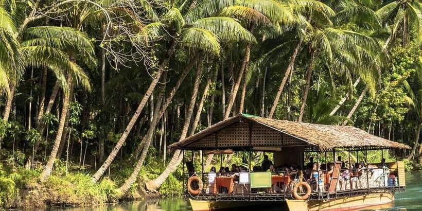 Bohol: Countryside Tour with Loboc (Buffet Lunch) - Butterfly and python stop, with an important animal welfare note