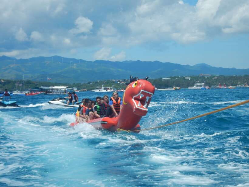 Boracay: Inflatable Banana or Dragon Boat Ride - Who should book the banana or dragon boat?