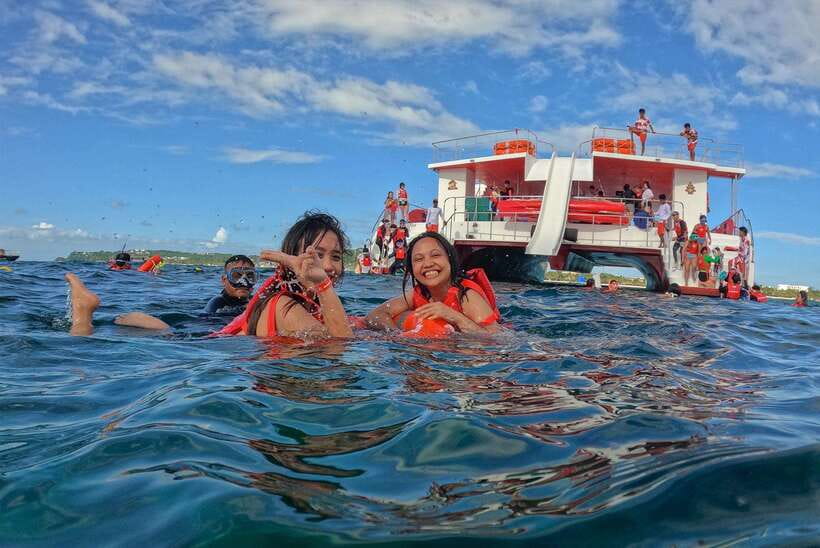 Boracay: Red Whale Party Cruise w/ Snacks & Water Activities - Settling in with pika-pika and drinks