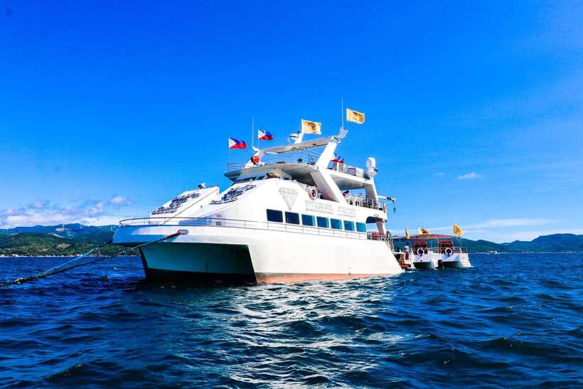 Boracay: Scenic Sunset Cruise with Live Music - Welcome drinks, fruit, and pica-pica