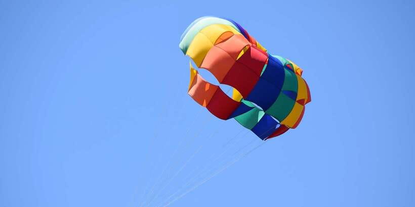 Boracay: Solo or Tandem Parasailing Experience - Getting fitted for safety gear at the floating station