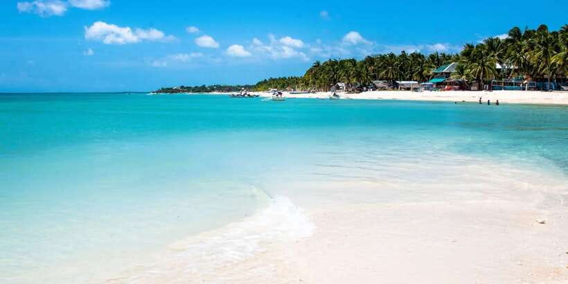 Cebu: Bantayan Island and Virgin Island Hopping Day Tour - Tricycle transport gives the island portion local character