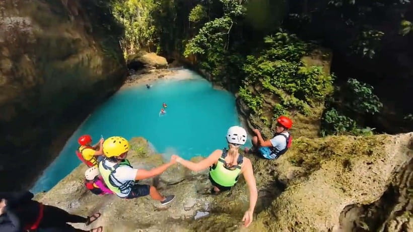 Cebu: Kawasan Falls Canyoneering Tour with Ziplining & Lunch - Flying above the jungle on the zipline