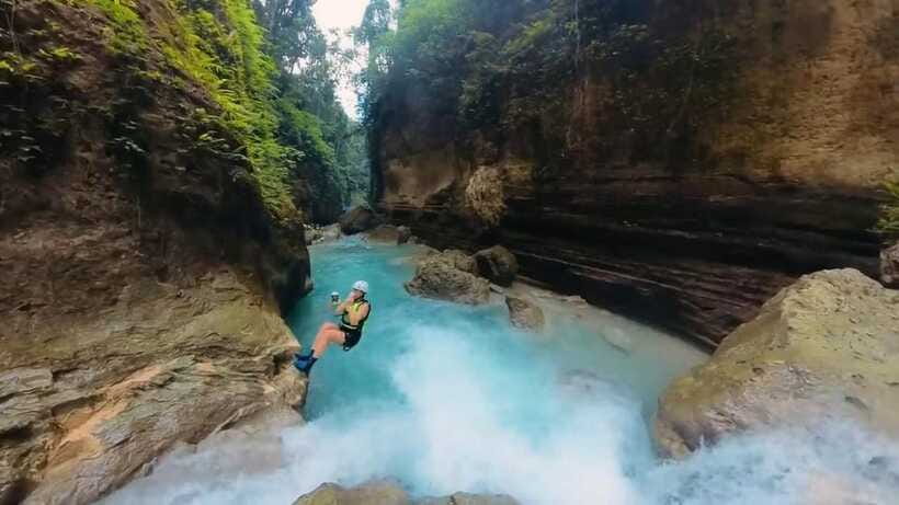 Cebu: Kawasan Falls Canyoneering Tour with Ziplining & Lunch - Reaching the multi-tiered Kawasan Falls