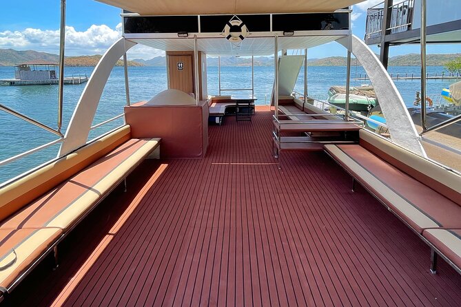 Coron Island Hopping via Private Double Decker Party Boat - Kayangan Lake and its 350-step climb
