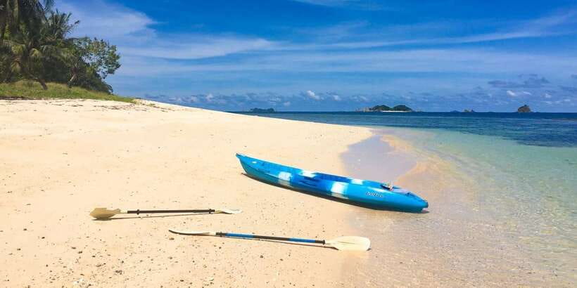 Coron: Private Tour with Kayangan Lake and Twin Lagoon - Beach lunch, bottled water, and practical comfort