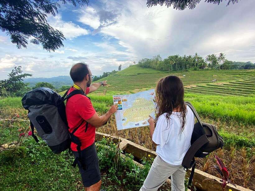 East Bohol Private Tour: Anda, Waterfalls & Lamanok Island - Calamay, fruit and the first taste of local life