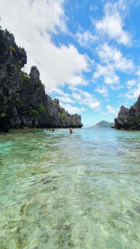 El Nido: Island Hopping and Snorkeling Private Boat Tour C - Hidden Beach: The Stop That Requires Some Work
