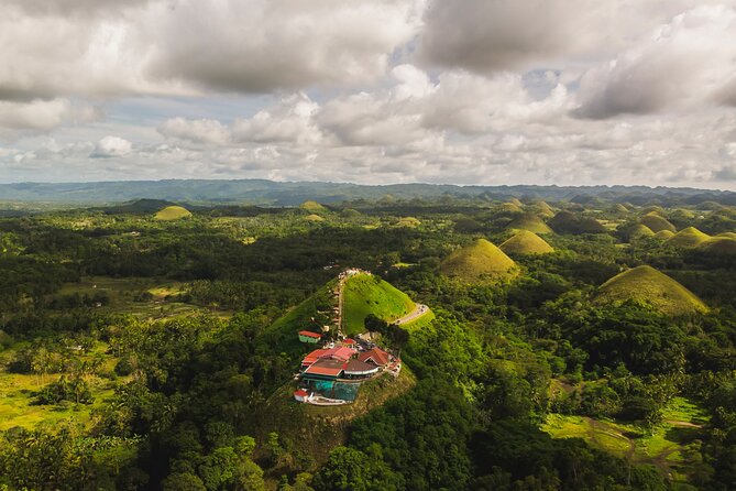 Famous Bohol Chocolate Hills Loboc River Cruise Tarsier Tour - Blood Compact Monument: a short lesson in Bohol’s past