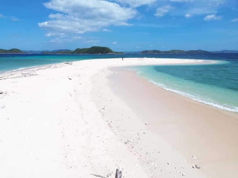 From Coron: Explore Busuanga Beach Escapade - Dibutonay Island: a strong first swim and snorkel