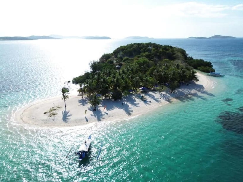 From Coron: Explore Busuanga Beach Escapade - South Cay Island: the lunch break with classic beach scenery