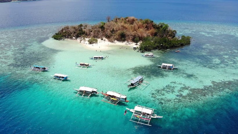 From Coron: Island Hopping Boat Day Trip with Buffet Lunch - What the $125 price really covers