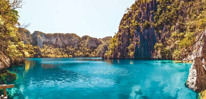 From Coron: Island Hopping Boat Day Trip with Buffet Lunch - Malcapuya Island and the beach stops