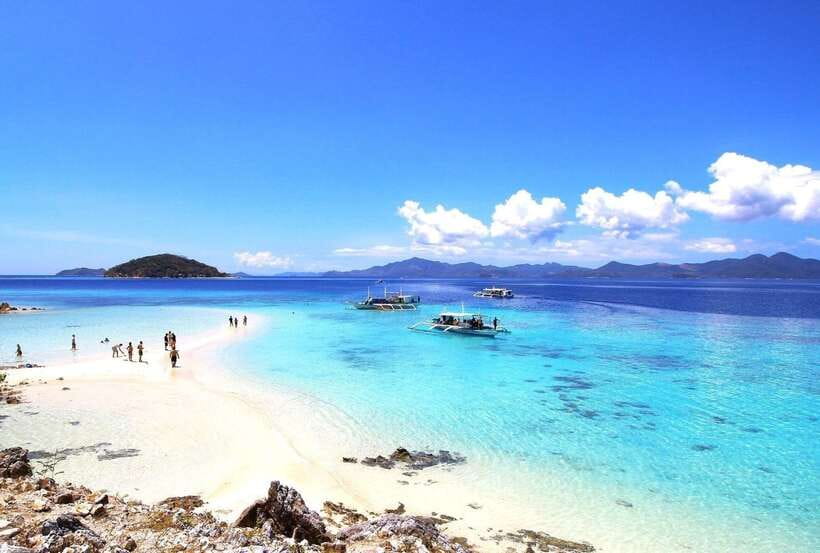 From Coron: Private Island-Hopping Cruise with Lunch - Picnic lunch with fruit and drinking water