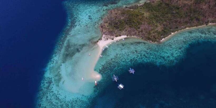 From Coron: Private Island-Hopping Cruise with Lunch - A private boat and a guide named Eric