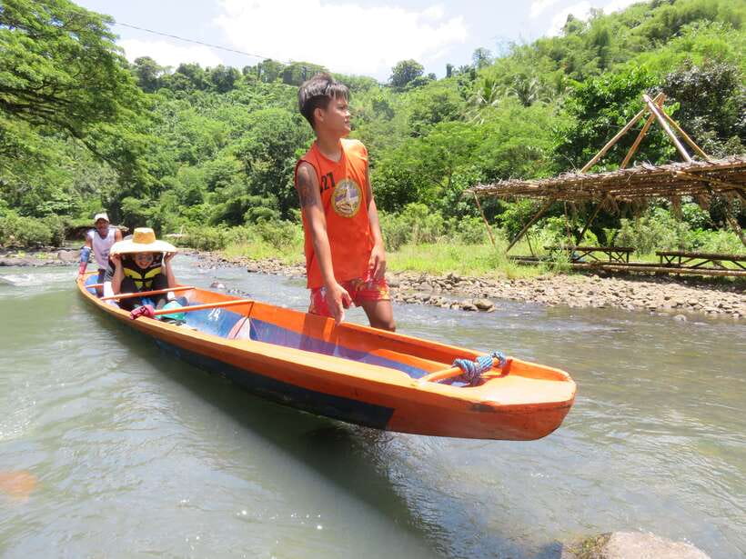 From Manila: Pagsanjan Falls Day Tour - The bamboo raft under the falls