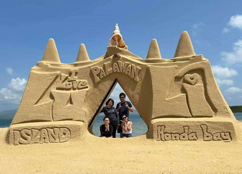 Honda Bay Island: Island Tour with Lunch & Transfer - Luli Island: a beach shaped by the tide