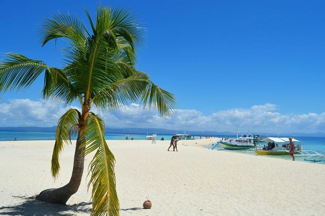 Kalanggaman Island Day Tour Package from Cebu City or Mactan - Shared boats, changing schedules, and extra charges