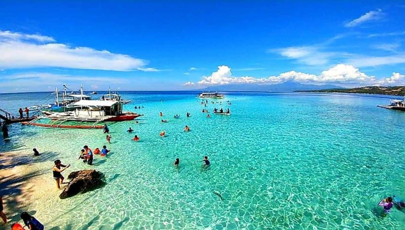 Mactan Island Hopping Gilutungan, Caohagan, Nalusuan + Lunch - Gilutungan: the day’s best water time