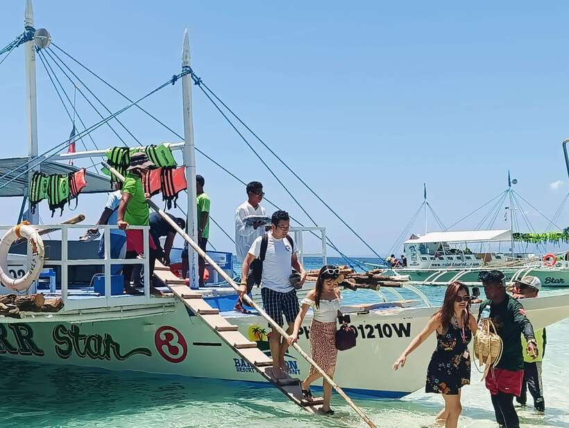 Oslob: Whaleshark Watching, Sumilon Island & Monkey Viewing - Breakfast in Oslob, then a stop at Tumalog Falls